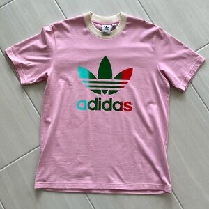 Like new, never worn. Men’s Adidas over sized heavyweight cotton pink tee.